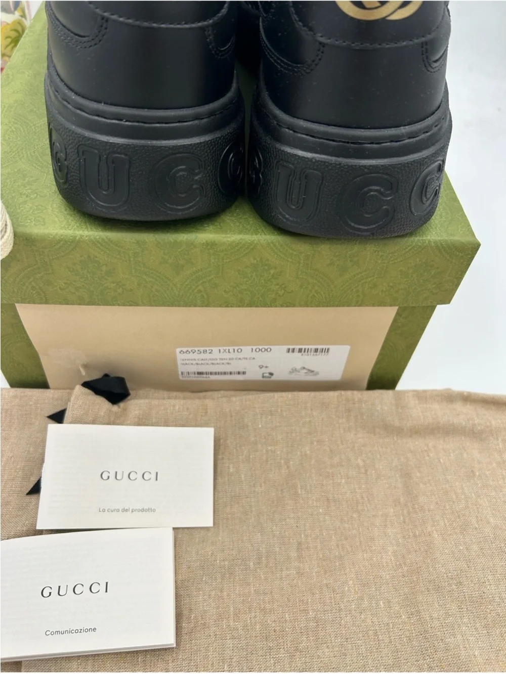 Men’s Gucci, Gigi embossed leather sneakers size 9.5 it’s 10.5 US made in Italy
